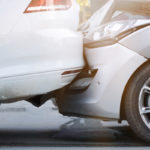 car lightly taps car in front and rear ends in fender bender car lightly taps car in front and rear ends in fender bender