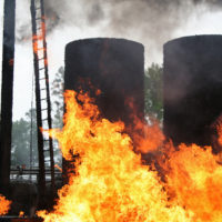 Aftermath of refinery explosion with fire