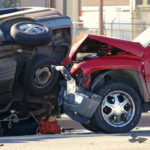 car wreck after accident with one car flipped to side car wreck after accident with one car flipped to side