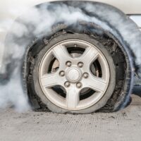 burst tire on the road